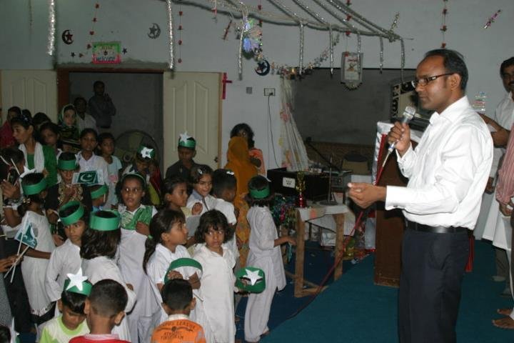 Pastor Shabeer preaching word of God to the kids