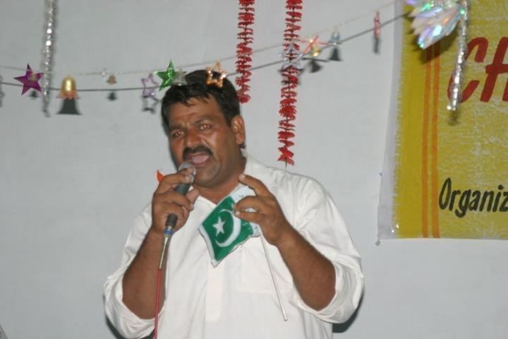 Nadeem Masih preaching the word of God to the kids