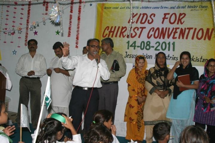 Pastor Shabeer preaching the word of God to the kids